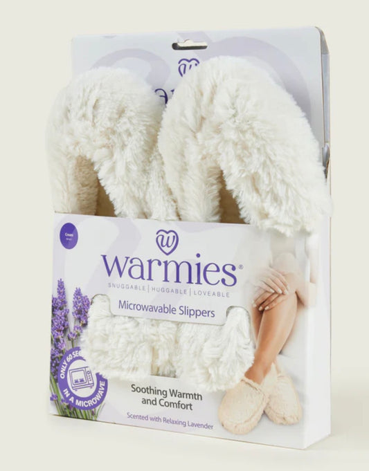 Packaging of Warmies microwavable slippers with a white background