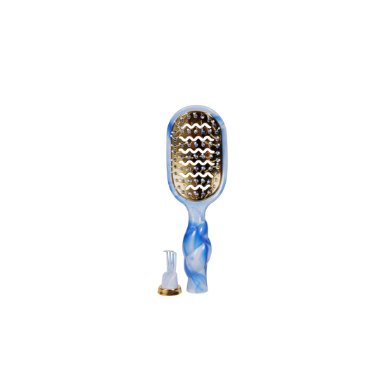Hairbrush with blue and white swirl handle on a white background