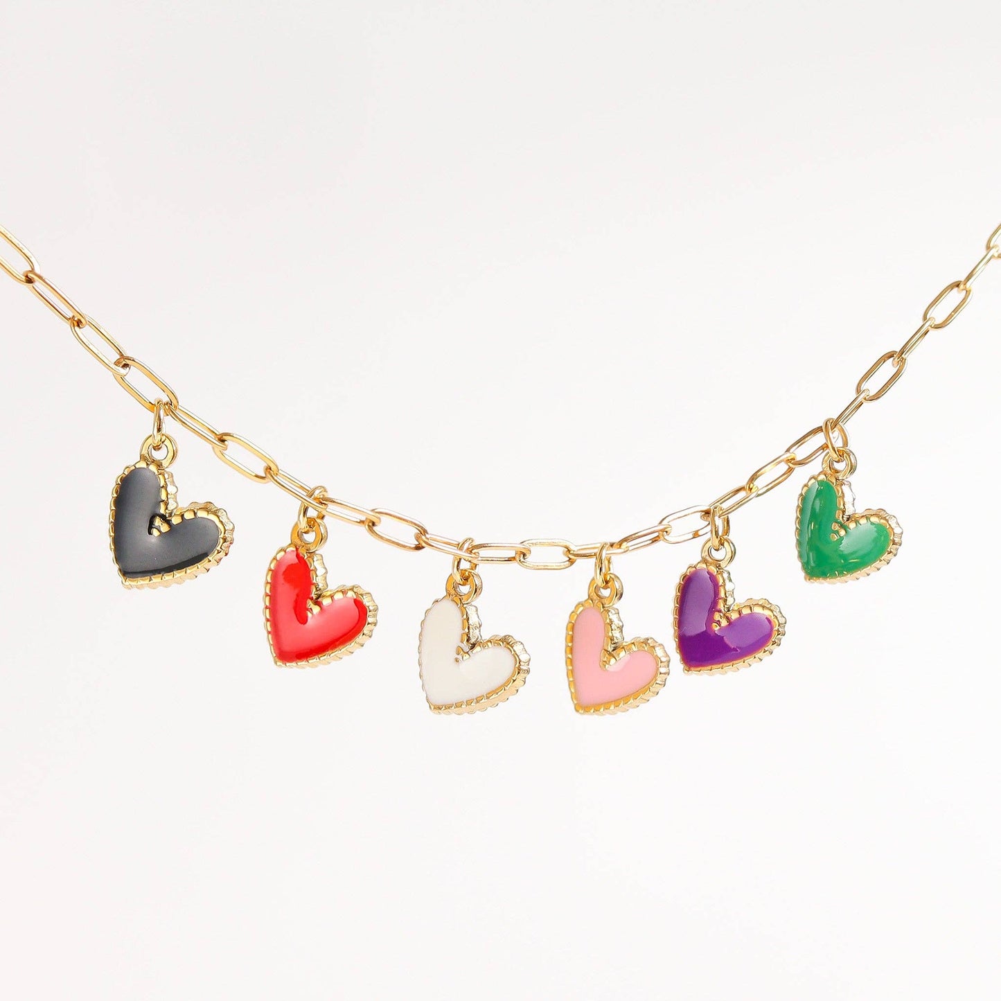 Necklace with colorful heart-shaped charms on a white background