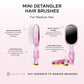 Pink mini detangler hair brush with mirror and cleaning tool on a white background