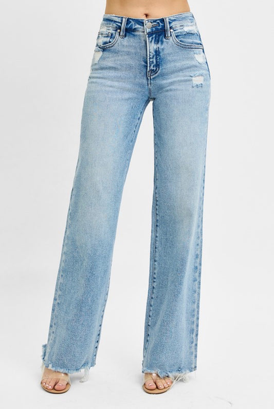 Risen tummy control jeans with mild distressing for women