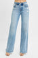 Risen tummy control jeans with mild distressing for women