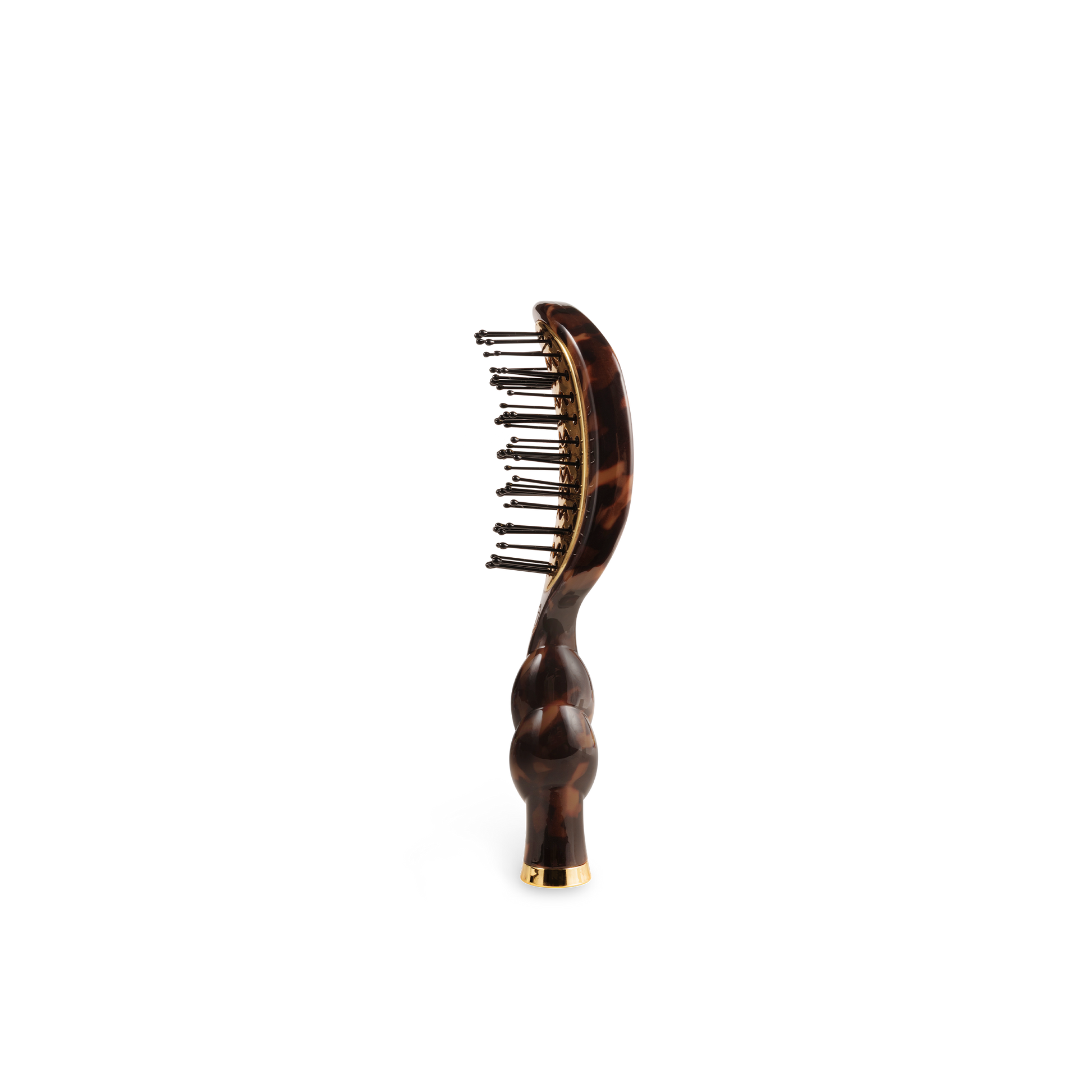 Hairbrush with tortoiseshell handle on a white background