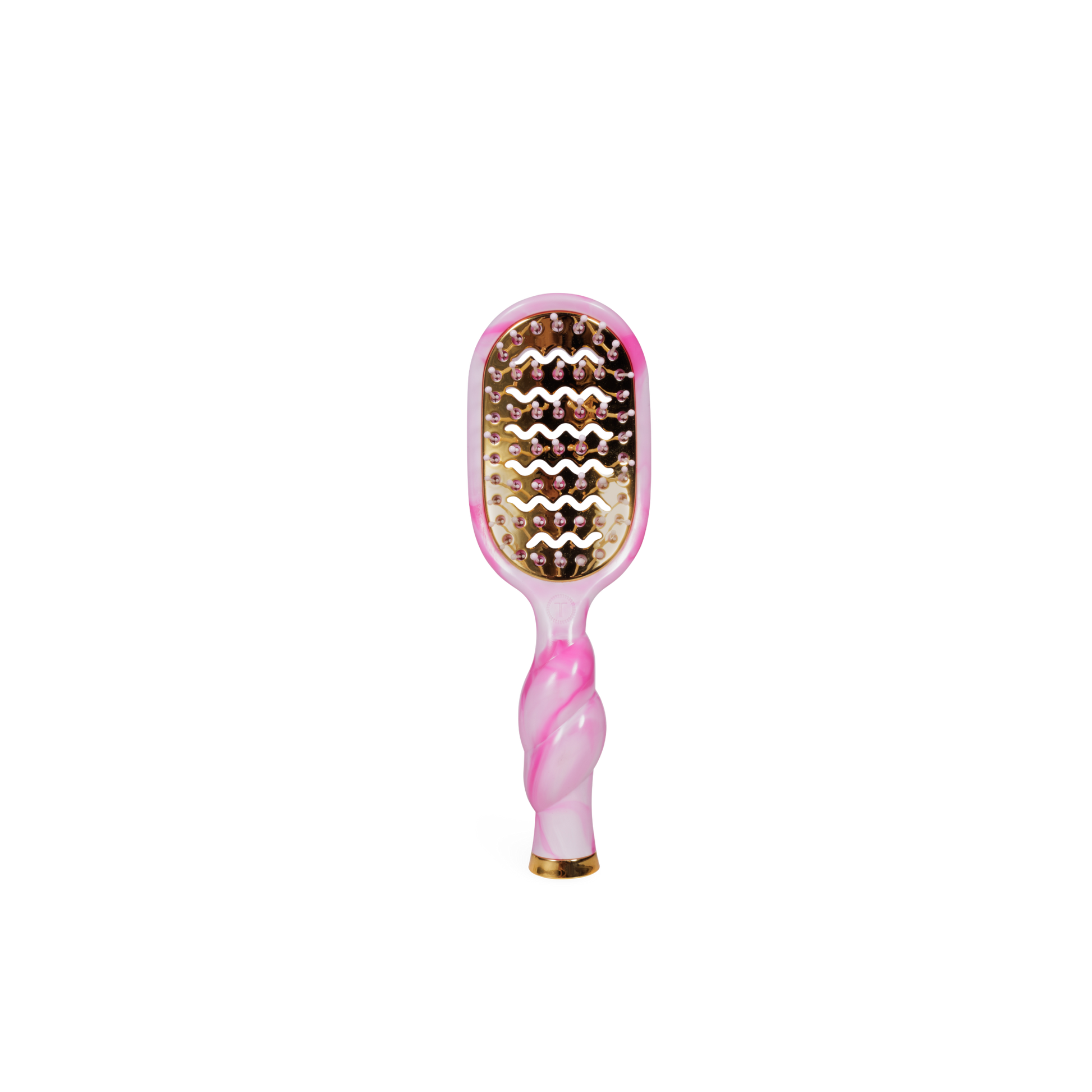 Pink and gold hairbrush on a white background