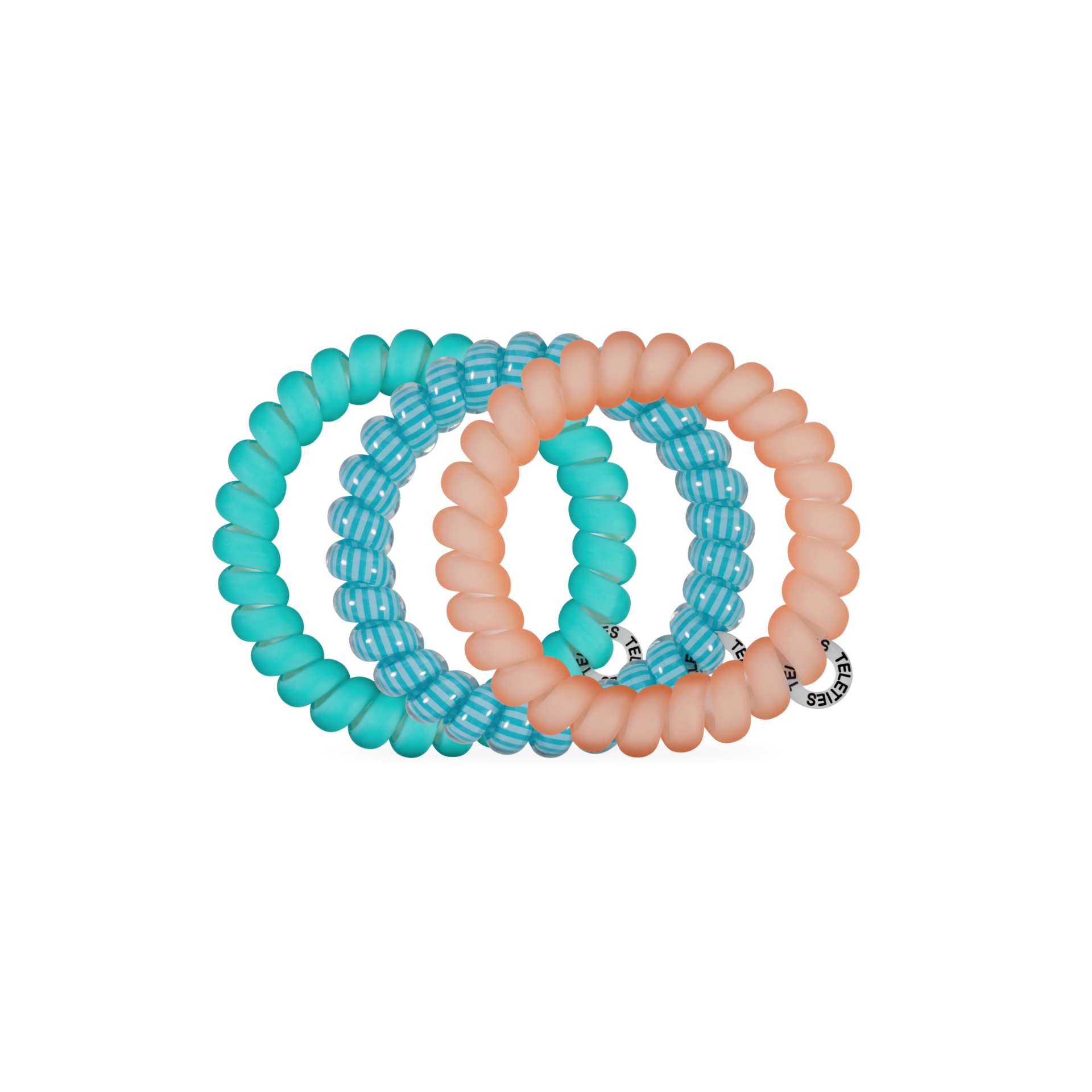 Set of three turquoise and peach-colored hair ties on a white background