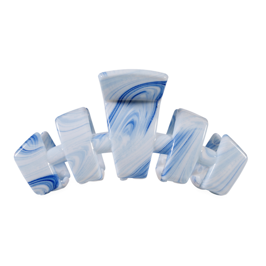 Blue and white marbled hair clip for your hair on a white background