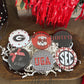 UGA game day decorative buttons in red, black, and white 