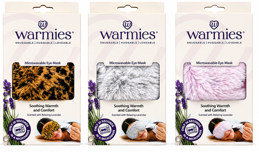 Three packages of Warmies eye masks with different designs and scents.